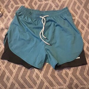 Women’s teal Blue and Black Athletic Shorts
Perfect comfort for summer